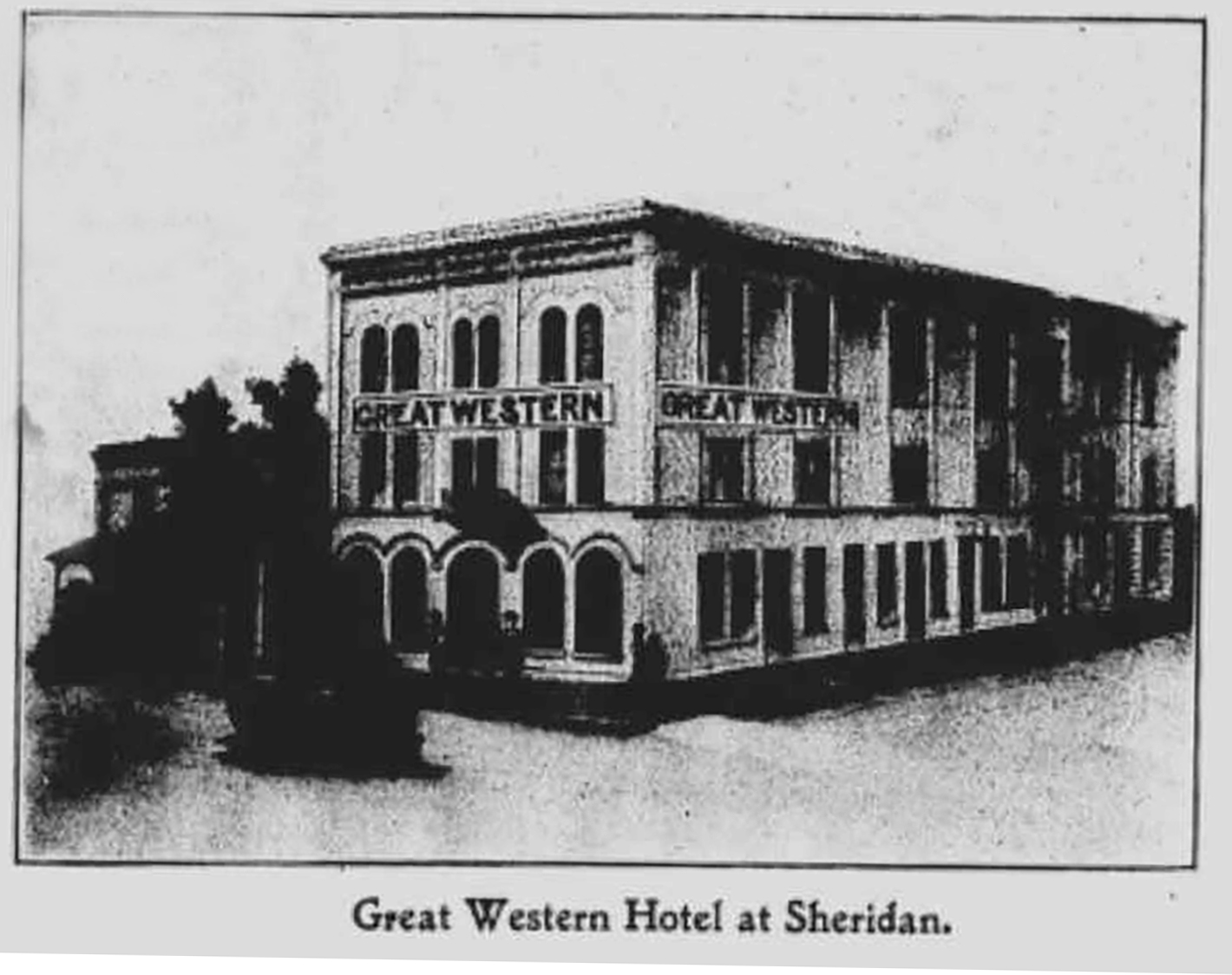 an old reproduction of a pen and ink sketch of the Great Western Hotel at Sheridan.A long regtangular 2 story white building with arched windows on the front with the sign &quot;GREAT WESTERN&quot;, and tall ectugual windows and another sign reading &quot;GREAT WESTERN&quot; along the side.